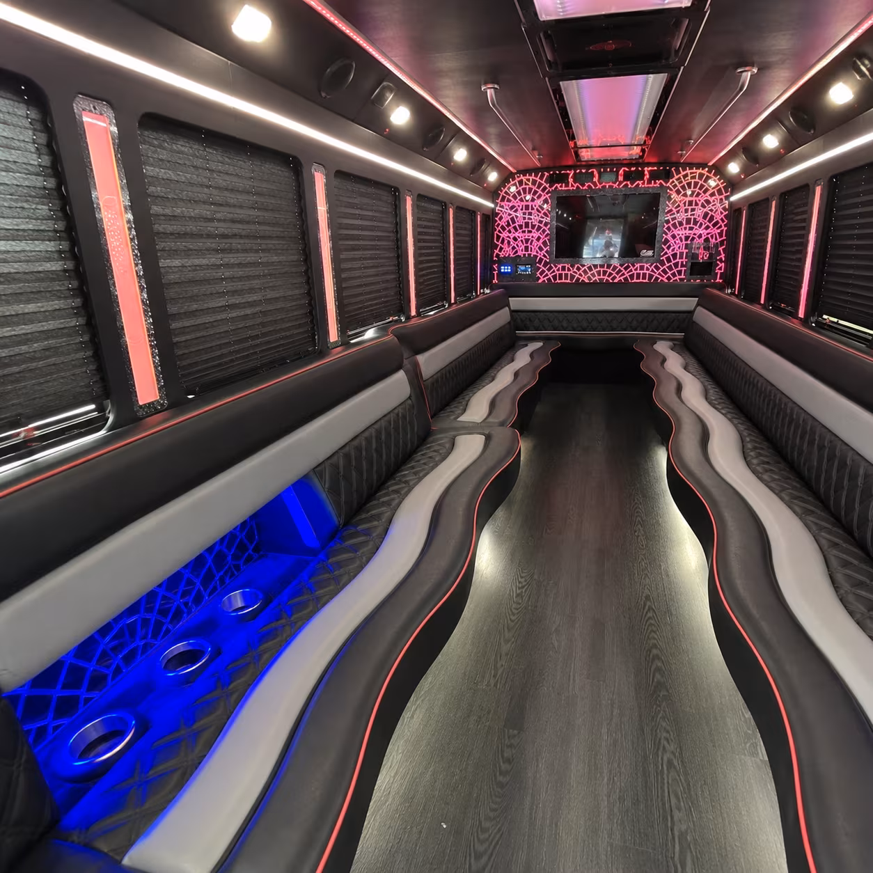 Passenger seating aboard a party bus rental serving New York